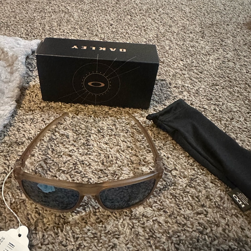 Oakley Tan Sunglasses with Dark Lenses
